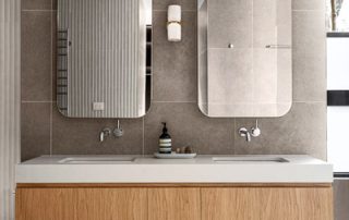 Modern Bathroom Pool House Vanity with Custom Mirrors Sleek pool house vanity unit in Boston Oak Woodmatt with bespoke drawers and custom mirrors.