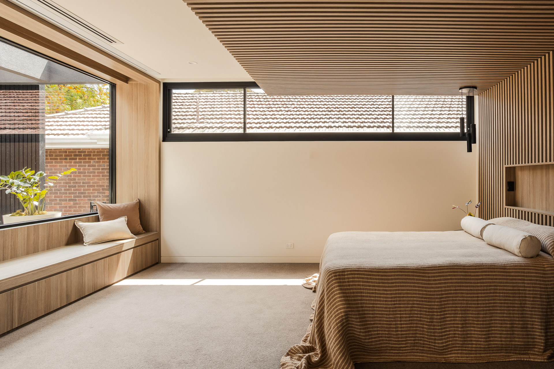 Architectural joinery in Eaglemont - bespoke window bench seat enhancing spatial flow.