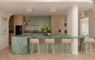 Hampton Residence – Sculptural Island Feature Contemporary kitchen featuring a marble sculptural island with integrated seating and custom cabinetry in soft maple.